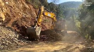 JCB excavator clearing blocked road | JCB clearing stones and making wide road | Excavator planet