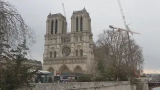 Cross nearly visible at the top of Notre-Dame Cathedral