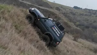 Nissan Patrol Gr Y61 Offroad playing in mud and climbing