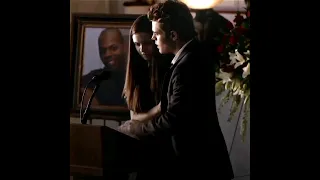 Stefan saving Elena from exposing herself