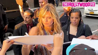 Heidi Klum Obliges Paparazzi & Signs Autographs For Fans While Leaving The Stephen Colbert Show