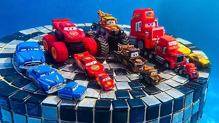 Looking for Disney Pixar Cars On the Rocky Road : Lightning McQueen, Mater, Dinoco McQueen, Mack