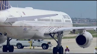 Plane Skids Off Icy Runway