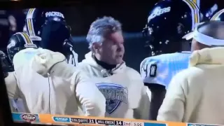 Coach headbutts football player with helmet on and busts his head open