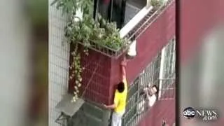 Chinese Boy Dangles From Balcony: Caught on Tape Video