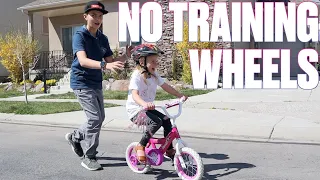 OLDER BROTHER TEACHES LITTLE SISTER HOW TO RIDE A BIKE FOR THE FIRST TIME ON NATIONAL SIBLINGS DAY