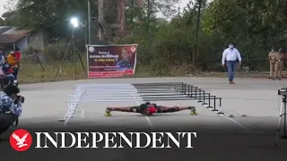 Teenager breaks world record for quickest 'limbo skate'