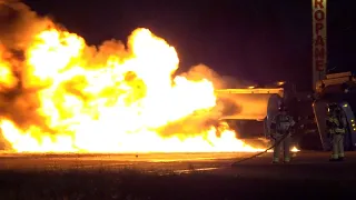 Raw video: 18-wheeler carrying around 8,800 gallons of unleaded fuel catches fire on North Freeway