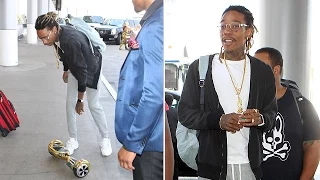 Wiz Khalifa Takes His Gold WI Board Through LAX