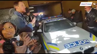 Police convoy leaving Pretoria high court