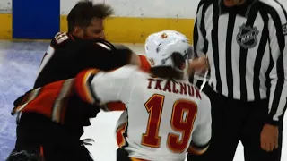 Ryan Kesler sends Matthew Tkachuk's mouthguard flying with right fist