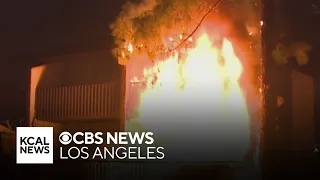 Long Beach fire crews tackle massive condo fire