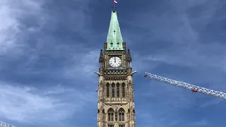 Canadian Parliament Ottawa - Peace Tower bell striking 12 O’clock mid-day