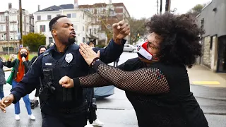 Cop KOs BLM dude in dress. With UFC commentary.