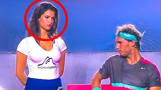 Hottest Ball Girl In Tennis History staring at  RAFAEL NADAL