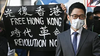 Hongkonger Aktivist fordert von Deutschland Sanktionen gegen China | AFP
