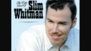 SLIM WHITMAN-BLUE EYES CRYING IN THE RAIN.mpg