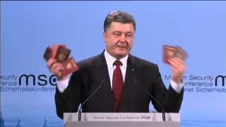 Munich Security Conference: Poroshenko shows Russian passports as proof of foreign troops in Ukraine