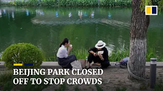 Authorities cordon off Beijing riverside park to stop residents from gathering amid Covid outbreak