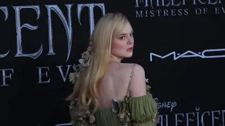 Elle Fanning looks a green great dress