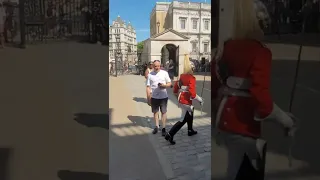 disrespectful tourist won't move for queen's  guard show no respect #horseguardsparade