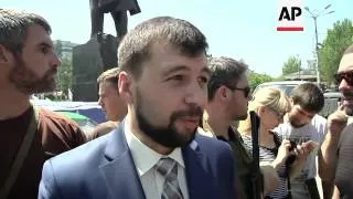 Pro-Russians gather in support of self-proclaimed Donetsk People's Republic