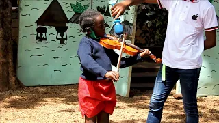 CINDIE YOUNG PLAYING VIOLIN