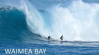 Surfing Big Waves at Waimea Bay on the North Shore of Oahu in Hawaii
