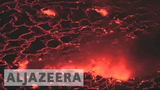 'See the spectacle': Tourism atop the world's biggest lava lake