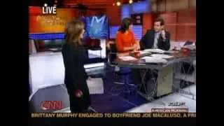 CNN American Morning - Soledad O'Brien in tan boots 18-Jan-2006