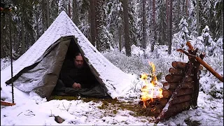 Winter Bushcraft Hike in the Northern Wilderness - Canvas Lavvu - Swedish Torch Cooking - Snow