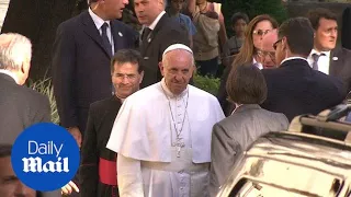 Cheering crowds welcome Pope Francis to Vatican nunciature - Daily Mail