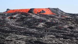 Overflowing lava lake (Erta Ale volcano, Ethiopia) - peak of eruption