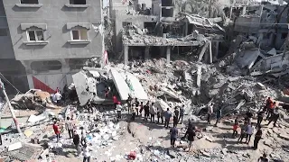 Aftermath of Israeli airstrike on Gaza bakery, injured and killed being carried away after separate