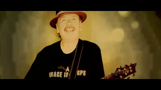 Santana Featuring Darryl “DMC” McDaniels - Let The Guitar Play