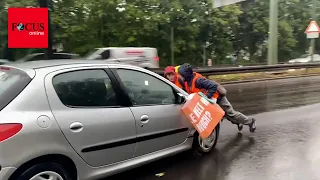 „Letzte Generation“ blockiert Straßen – Autofahrer nehmen Aktivisten auf die Haube