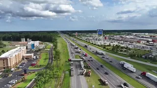 Drone footage shows overturned tractor trailer on I-95