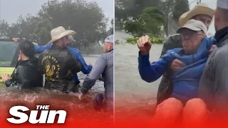 Elderly man rescued from waist high water in flooded car during Hurricane Ian