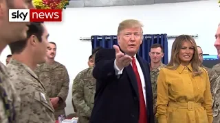 Donald Trump makes surprise visit to US troops in Iraq