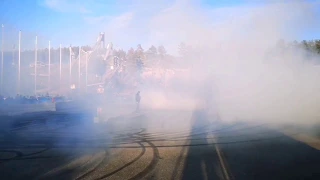 BMW E30 V8 LS1 burning tires at a carmeet