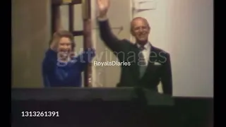 Queen Elizabeth laughing and dancing onboard Britannia