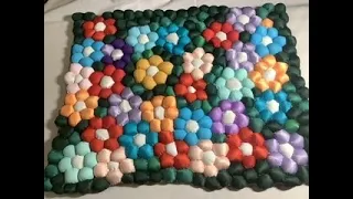 From old pillows and scraps of knitwear - a mosaic rug!