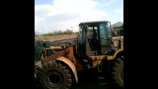 Operando Cargador cat 966H y yucle