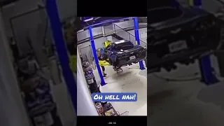 Corvette falls off lift