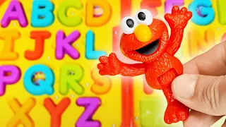 Help Elmo and Friends Find Missing ABC with Colorful Toys 🍭📚