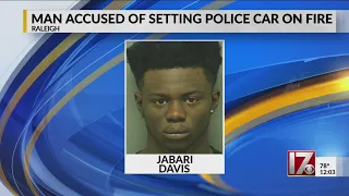 Man accused of trying to set Raleigh police car on fire