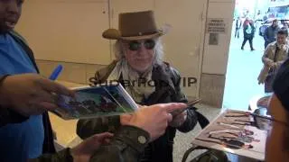 Brad Whitford of Aerosmith exits VH1 and signs for fans i...