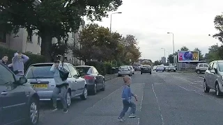 Close Call - Kid runs out in front of car.