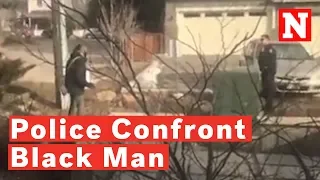 Watch: Police Confront Black Man Picking Up Trash Outside His Home