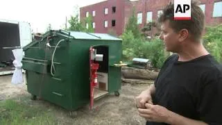Artist turns dumpster into home from home